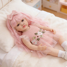 Load image into Gallery viewer, 55cm Full Vinyl Toddler Doll "Betty" with Removable Red Wig, Straight Legs & Stunning Purple Eyes – Waterproof Realistic Collectible Doll