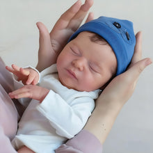 Carica l'immagine nel visualizzatore di Gallery, Laura: Your Newborn Cuddle Companion  19" Sleepping Snuggly Plush Rebrorn Baby Doll with Implanted Hair Cozy Blue Hat