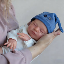 Carica l'immagine nel visualizzatore di Gallery, Laura: Your Newborn Cuddle Companion  19" Sleepping Snuggly Plush Rebrorn Baby Doll with Implanted Hair Cozy Blue Hat