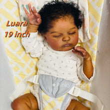 Carica l'immagine nel visualizzatore di Gallery, Laura 19 inch African American Reborn Doll - Cloth Body, Rooted Black Curly Hair & White Footed Onesie | Full Limbs, Deep Skin Tone
