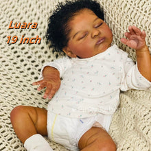 Carica l'immagine nel visualizzatore di Gallery, Laura 19 inch African American Reborn Doll - Cloth Body, Rooted Black Curly Hair & White Footed Onesie | Full Limbs, Deep Skin Tone