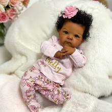 Carica l'immagine nel visualizzatore di Gallery, Bettie 18" African American Cloth Body Doll - Hand-Rooted Jet-Black Curls + Blush Pink Floral Print Footed Set & Bonnet | Deep Skin Tone
