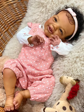 Загрузить изображение в средство просмотра галереи, 20 Inch Charlie Brown Skin Doll - Hand-Painted Curly Hair, Sparkling Blue Glass Eyes No Eyelashes in Pink Polka Dot Overalls Set, Soft Cloth Body & HD Blush