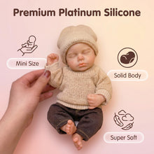 Laden Sie das Bild in den Galerie-Viewer, 6" Sleeping Silicone Baby Doll | 150g Solid Platinum Silicone | Realistic Closed-Eyes Reborn | Mini Pocket Pal with Knit Sweater Outfit