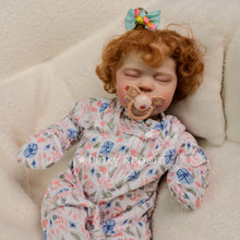 Load image into Gallery viewer, Realistic 19 Inch Baby Doll with Red Hair & Pacifier - Soft Cloth Body, Printed Long Sleeve Footie Pajamas, Sleeping Eyes