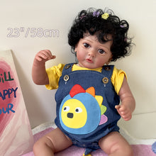 Load image into Gallery viewer, 23" 58cm Cloth Body Doll with Full Arms & Legs - Ayana Africa-American Reborn Black Planted Hair Black Curly Hair with Red Bowknot Dinosaur Suspender Pants