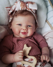 Load image into Gallery viewer, Vivienne 19-Inch Smiling Reborn Baby Doll with Brown Curly Hair & Blue Eyes | Choose Soft Body or Waterproof Full Vinyl Girl Doll | Includes Magnetic Pacifier, Bottle, Outfit & Birth Certificate