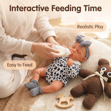 Carica l'immagine nel visualizzatore di Gallery, 12.6" Sleeping Weighted Reborn Silicone Baby Doll | 2.4 lbs (1.1kg) Lifelike Size &amp; Weight | Openable Mouth for Feeding &amp; Pacifier | Premium Platinum Silicone | Cow Print Romper &amp; Striped Bow
