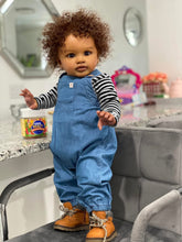 Cargar imagen en el visor de la galería, 26&quot; Deep Skin Baby Doll with Implanted Brown Afro &amp; 3D Eyes - Denim Overalls w/ Black-White Striped Lining - Realistic Pippa
