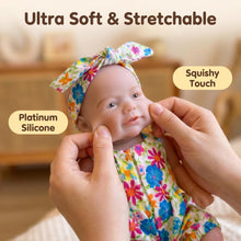 Load image into Gallery viewer, 8" Realistic Silicone Baby Doll with Openable Mouth | Platinum Silicone Squishy Touch | Includes Milk Bottle &amp; Pacifier | Colorful Floral Outfit | Immersive Role-Play Gift
