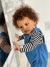 Cargar imagen en el visor de la galería, 26&quot; Deep Skin Baby Doll with Implanted Brown Afro &amp; 3D Eyes - Denim Overalls w/ Black-White Striped Lining - Realistic Pippa

