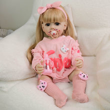 Cargar imagen en el visor de la galería, 22 Inch Full Vinyl Reborn Baby Girl - Blonde Wig, Blue Eyes, Gentle Paint &quot;Betty&quot; in Pink Bunny Print Long Sleeve Onesie
