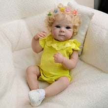 Cargar imagen en el visor de la galería, Blonde Curly Hair Bettie Reborn Baby Doll - 18&quot; Cloth Body Girl in Yellow Romper with Flutter Sleeves &amp; Round Collar - Blue Eyes
