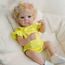 Cargar imagen en el visor de la galería, Blonde Curly Hair Bettie Reborn Baby Doll - 18&quot; Cloth Body Girl in Yellow Romper with Flutter Sleeves &amp; Round Collar - Blue Eyes
