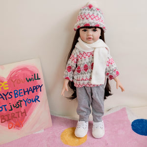 55cm Reborn Baby Girl Doll "Betty" with Long Brown Hair, Blue Eyes, Full Vinyl Body | Wearing Flower Sweater + White Sneakers