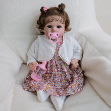 Cargar imagen en el visor de la galería, 20 inch Caucasian Baby Doll Arianna - Rooted Brunette Curls &amp; Vivid Blue Eyes | Brown Floral Dress  Ultra-Snuggly Cloth Body
