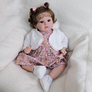 20 inch Caucasian Baby Doll Arianna - Rooted Brunette Curls & Vivid Blue Eyes | Brown Floral Dress  Ultra-Snuggly Cloth Body