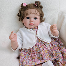 Cargar imagen en el visor de la galería, 20 inch Caucasian Baby Doll Arianna - Rooted Brunette Curls &amp; Vivid Blue Eyes | Brown Floral Dress  Ultra-Snuggly Cloth Body
