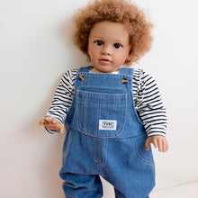 Cargar imagen en el visor de la galería, 26&quot; Deep Skin Baby Doll with Implanted Brown Afro &amp; 3D Eyes - Denim Overalls w/ Black-White Striped Lining - Realistic Pippa
