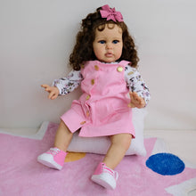 Cargar imagen en el visor de la galería, 24&quot; African American Baby Doll Ellie - Rooted Long Brown Curls &amp; Chocolate Eyes | Pink Overalls with Floral Lining | Ultra-Soft Cloth Body
