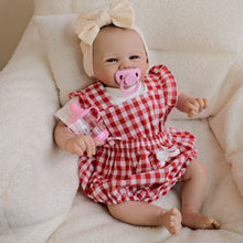 Carregar imagem no visualizador da galeria, 19inch Reborn Baby Girl Vivienne - Christmas Gift with Red Grid Apron | Choose Cuddly Plush or Vinyl Body for Kids
