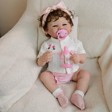 Load image into Gallery viewer, 19inch Reborn Baby Girl Vivienne - Full Vinyl Body with Rooted Brown Curls Blue Eyes, Embroidered White Top
