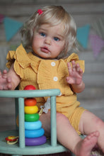 Cargar imagen en el visor de la galería, 24 Inch Fabric Body Reborn Baby Doll - Golden Haired Ellie in Yellow Gauze Flutter Sleeve Outfit, Blue Eyes
